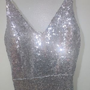 Silver small sequin homecoming dress .